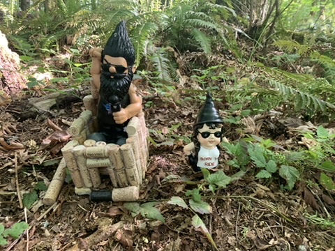 Two gnome figures with sunglasses along the Gnome Trail