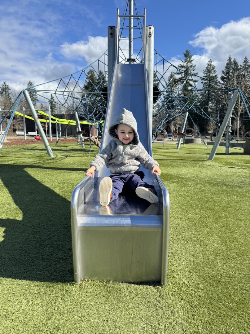 Jody's son on the slide at Covington Community Park
